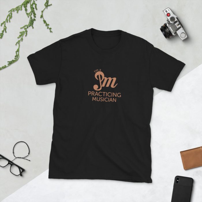 Black t-shirt practicing musician - learning to play a music instrument