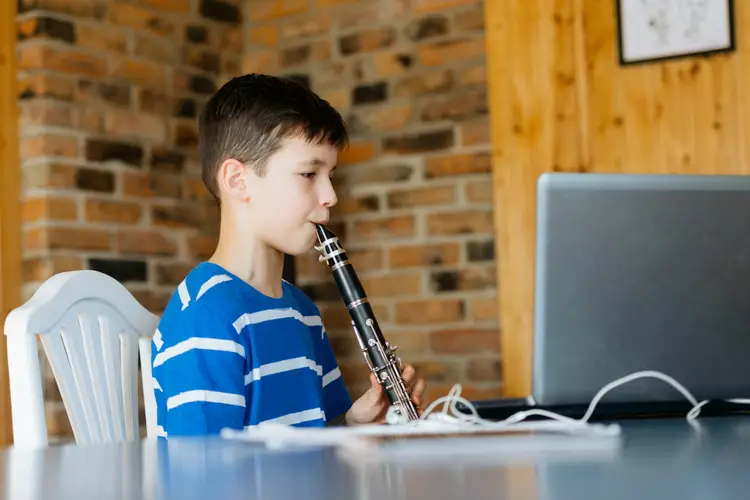 Child taking a free online music lesson