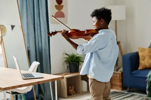 Child Learning Violin Online