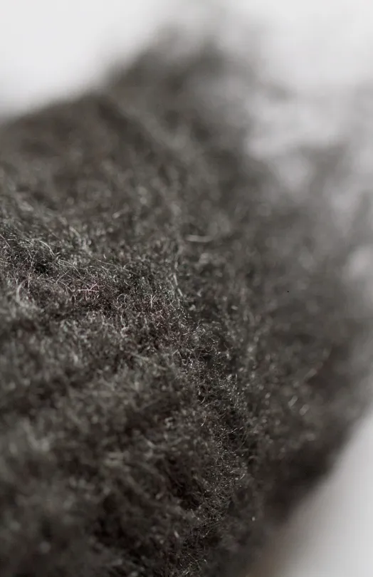 Fine steel wool (grade #0000) used on the cello