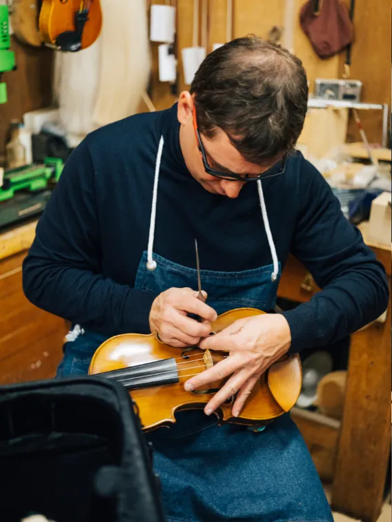 String instrument repair in process