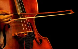 striking a double bass