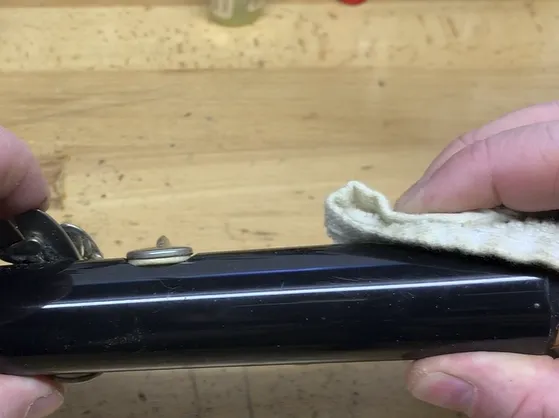 Applying pressure to secure a replaced clarinet pad in place clarinet pad replacement