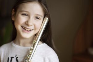 child learning the flute